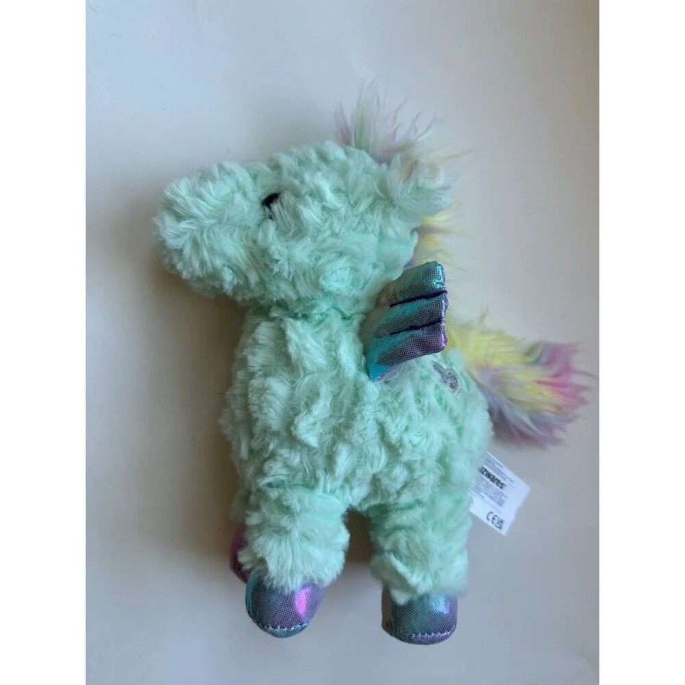 Mint green unicorn plush from jazzwares